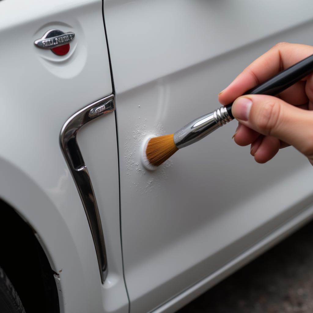 Applying touch-up paint to a car chip with precision