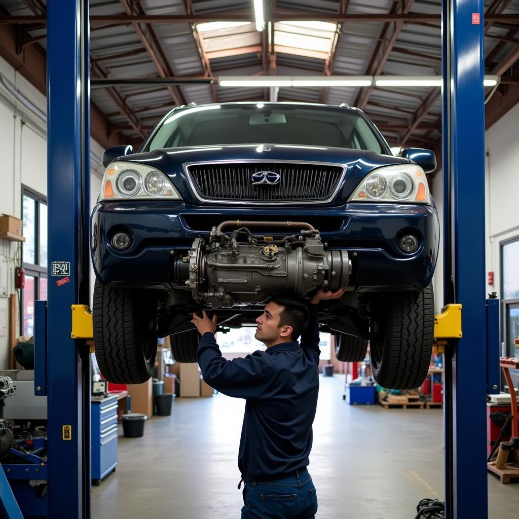 Car being serviced for transmission issues at an auto repair shop