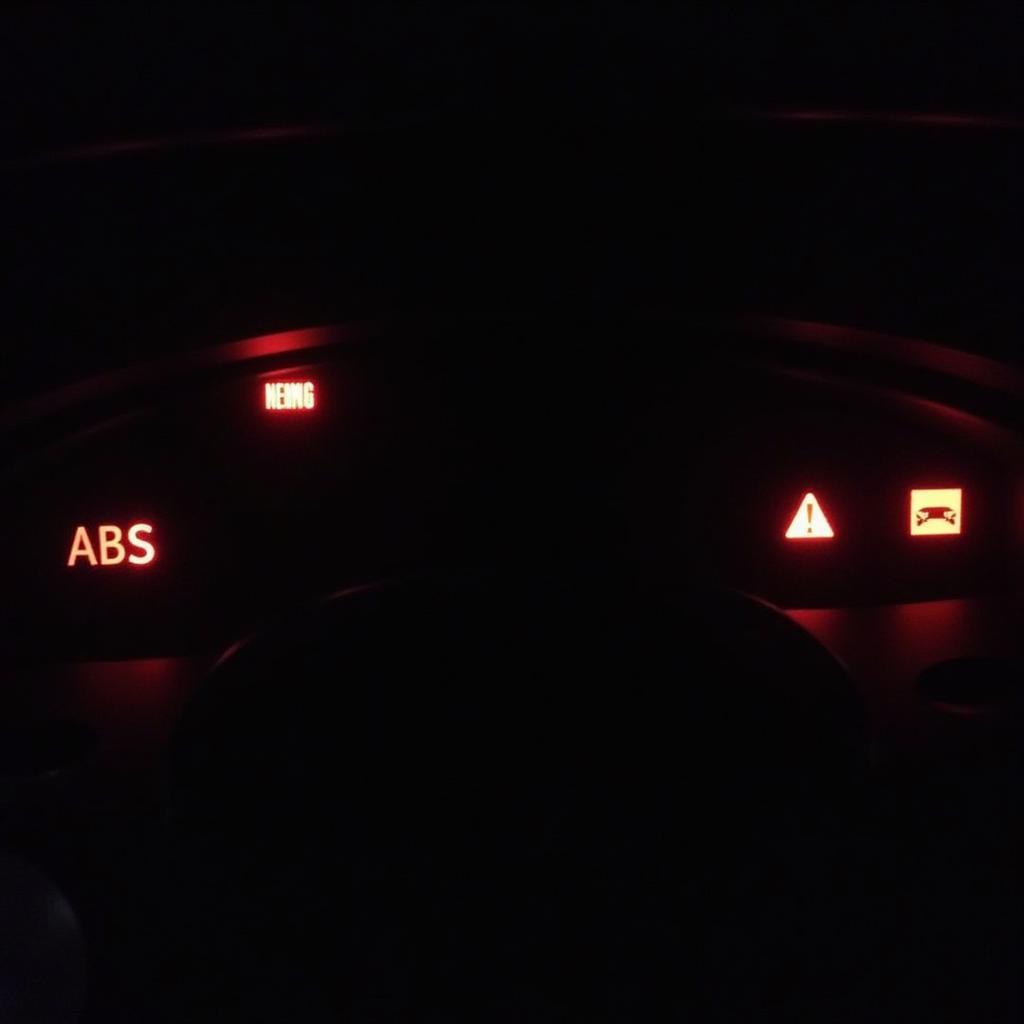 Car dashboard with warning lights illuminated