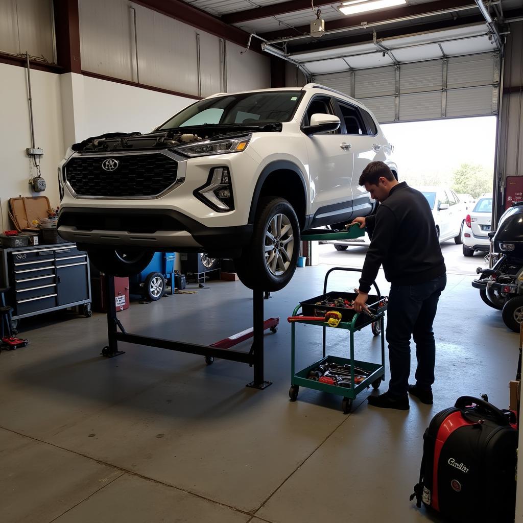 Mechanic inspecting a car engine