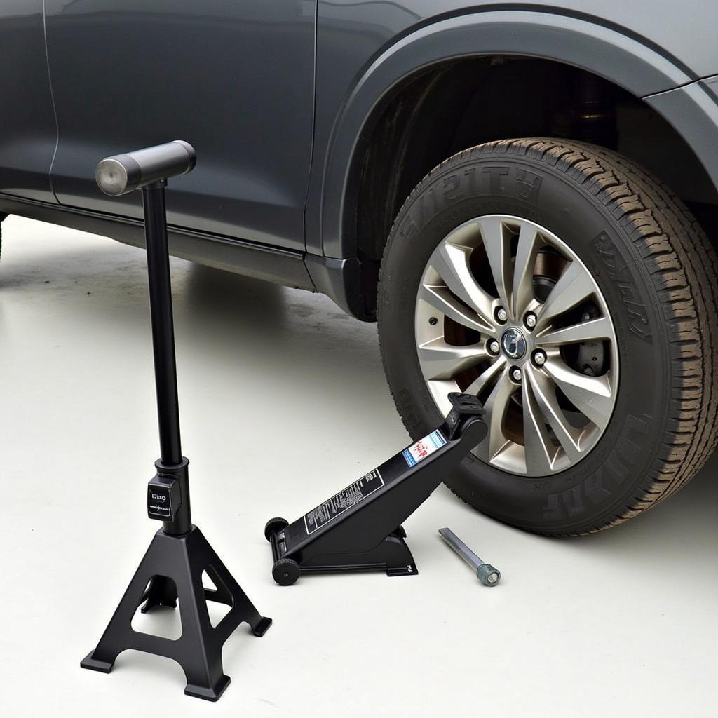 Essential tools for lifting a car safely for maintenance