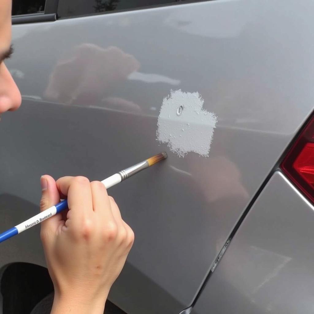 Applying touch up paint to a 2016 Honda Fit