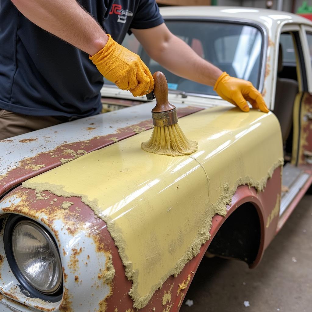 Applying Fiberglass Mat and Resin to Car Rust