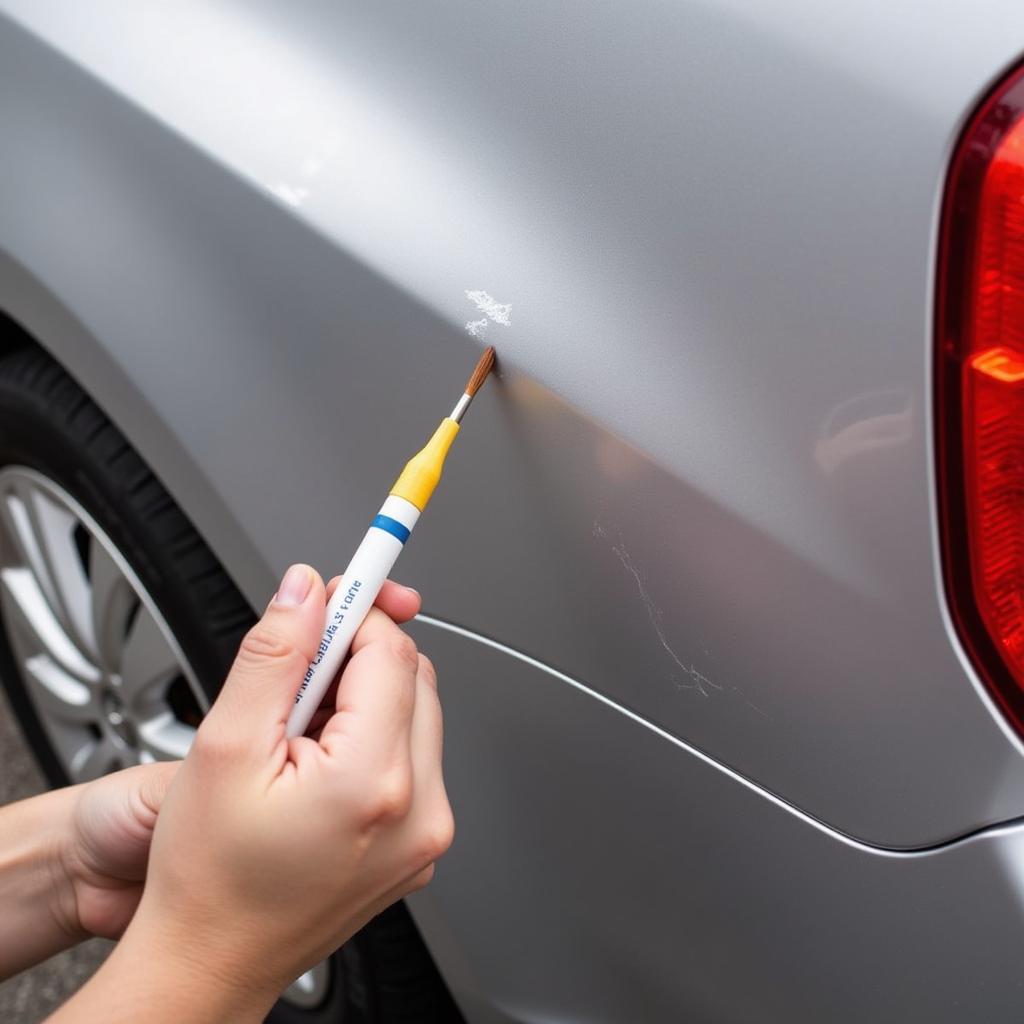 Applying Touch-Up Paint to Car Scratch