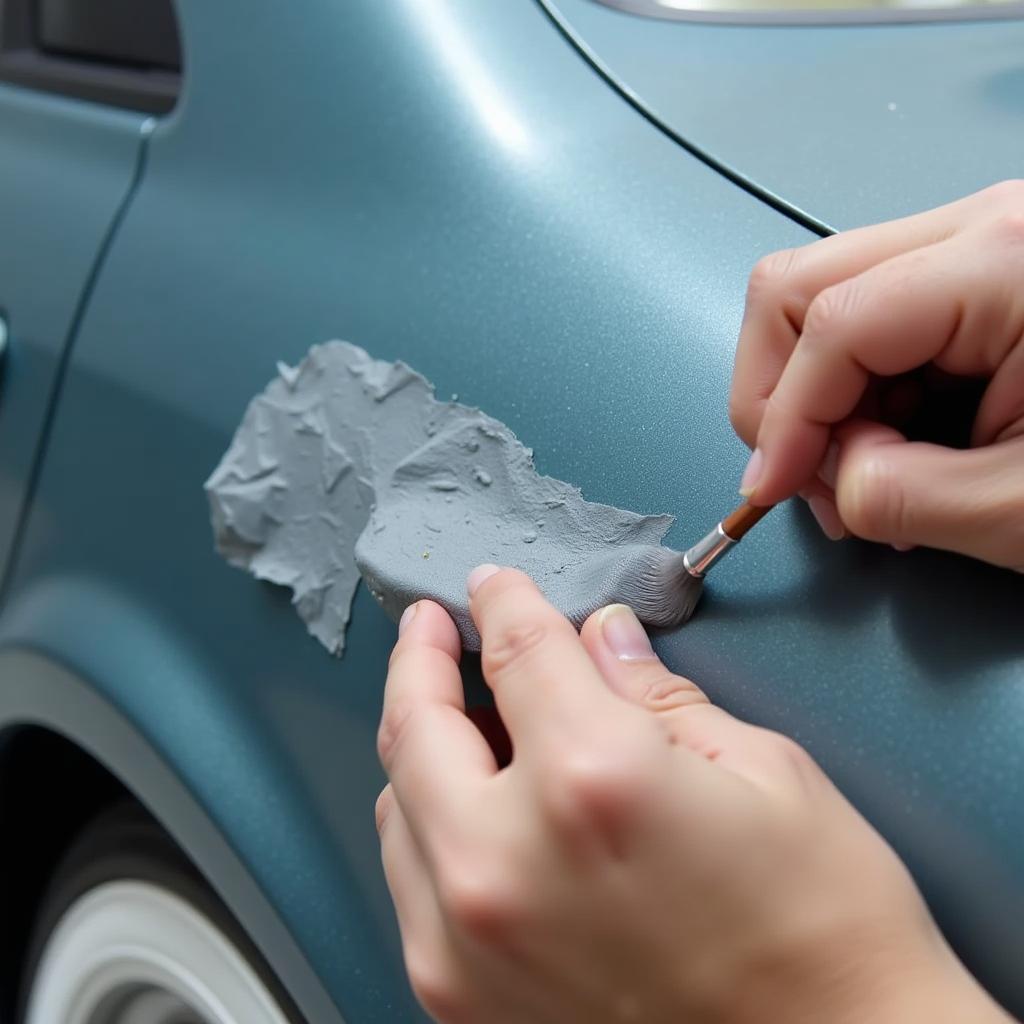 Applying Touch Up Paint to Car Panel