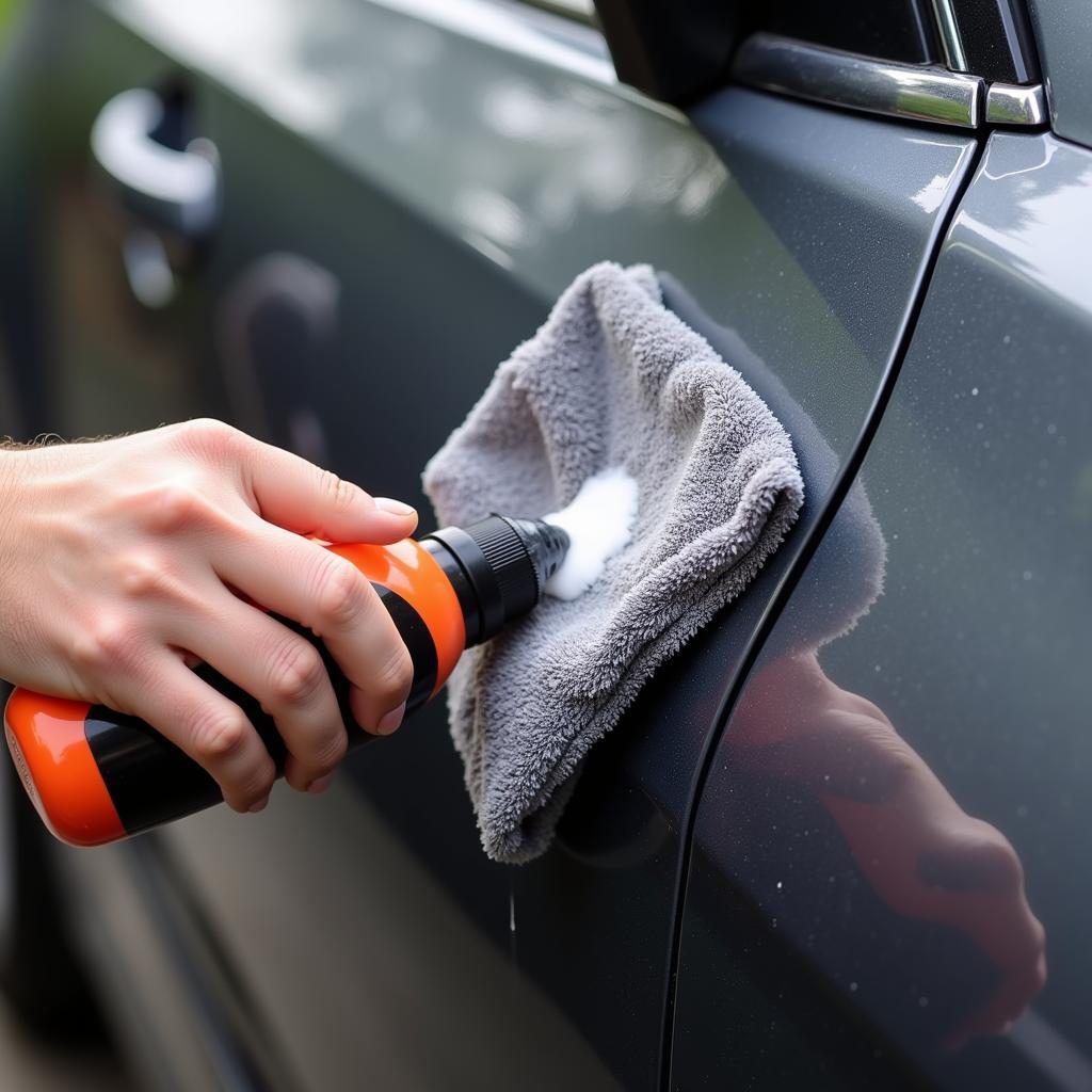 Applying Rubbing Compound to a Car Swipe