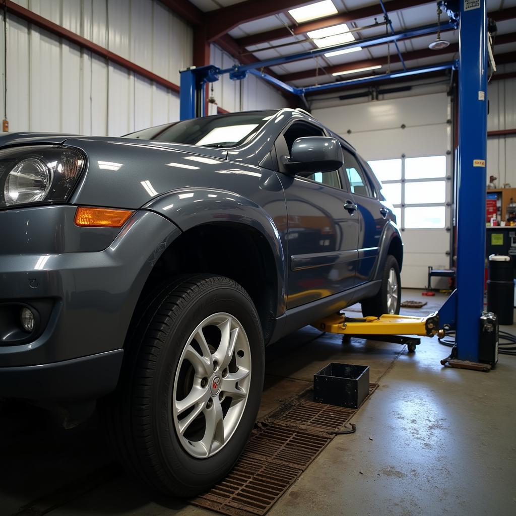 Car Undergoing Routine Maintenance in a Garage