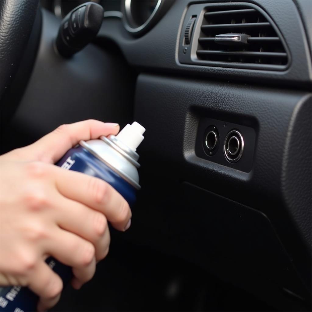 Cleaning a Car's Aux Port with Compressed Air