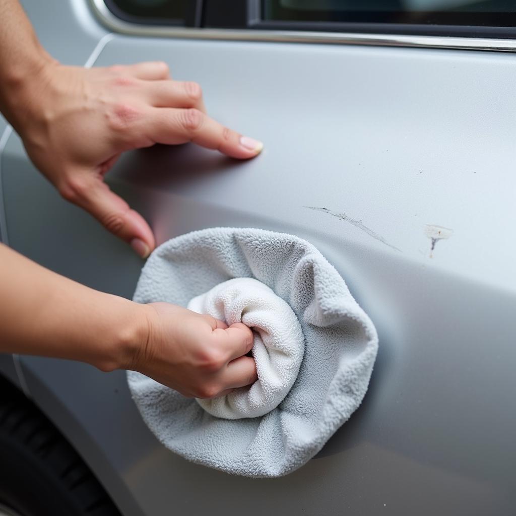 DIY Scratch Repair on Silver Car