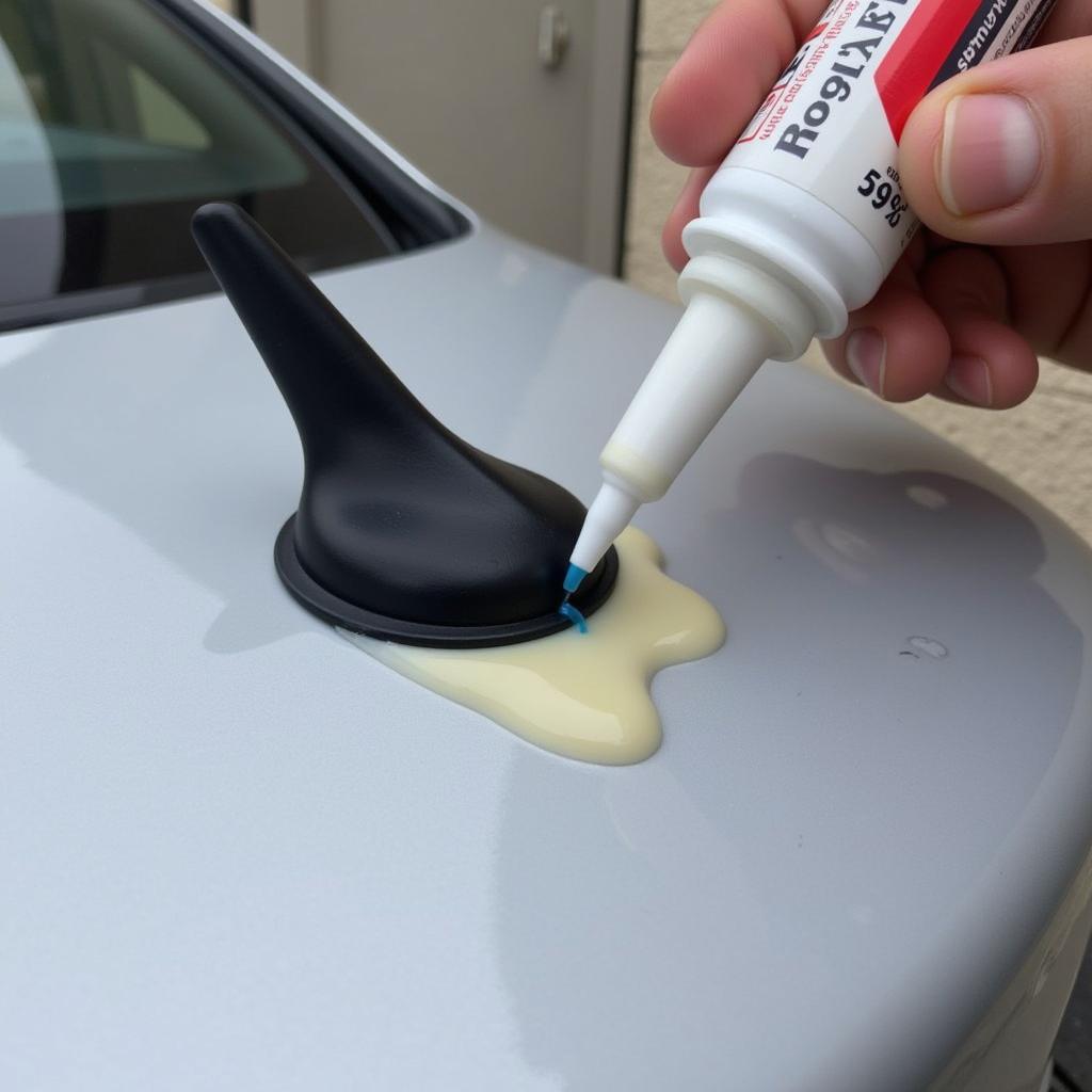 Incorrect Application of Liquid Nails to Car Antenna