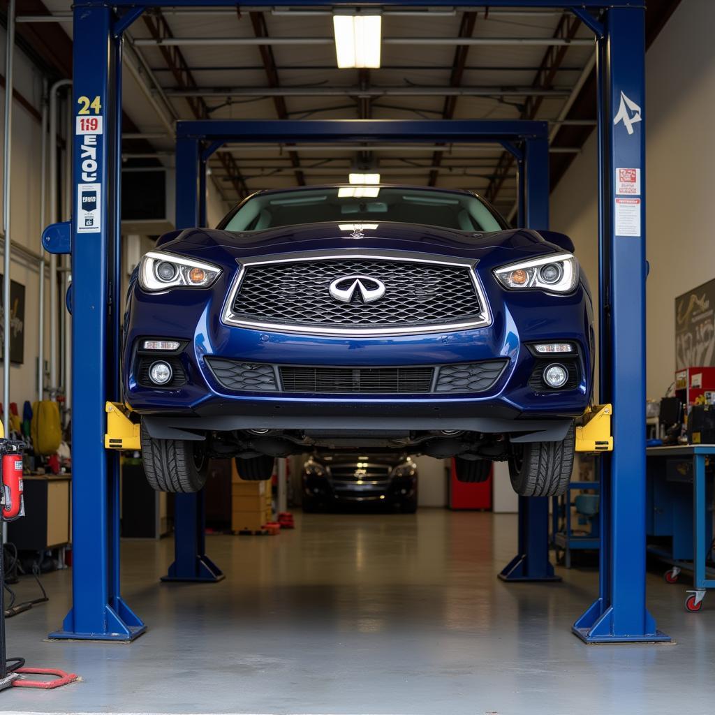 Infinity Car on a Lift for Inspection