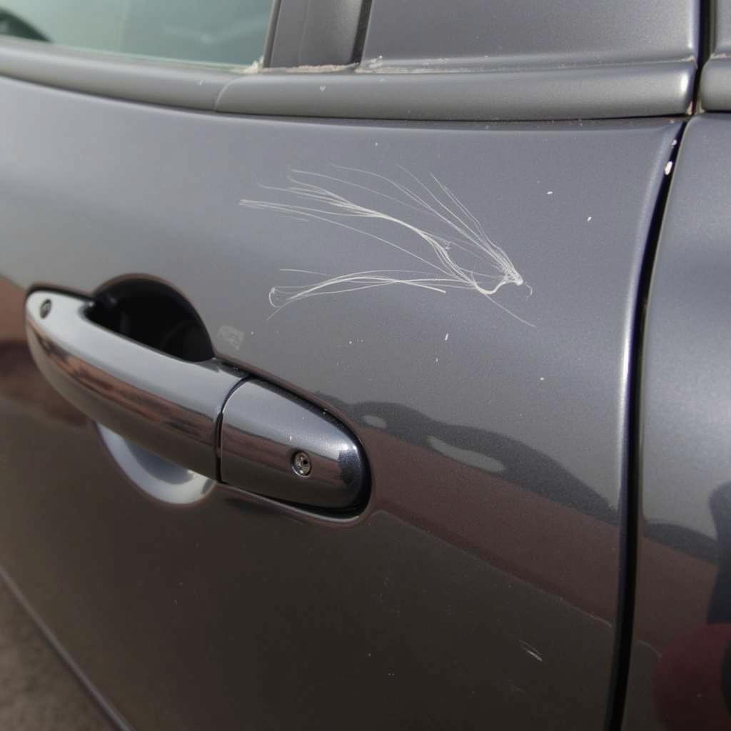 Minor Vinyl Scratches on Car Door