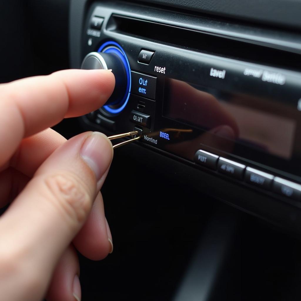 Resetting car stereo using the reset button