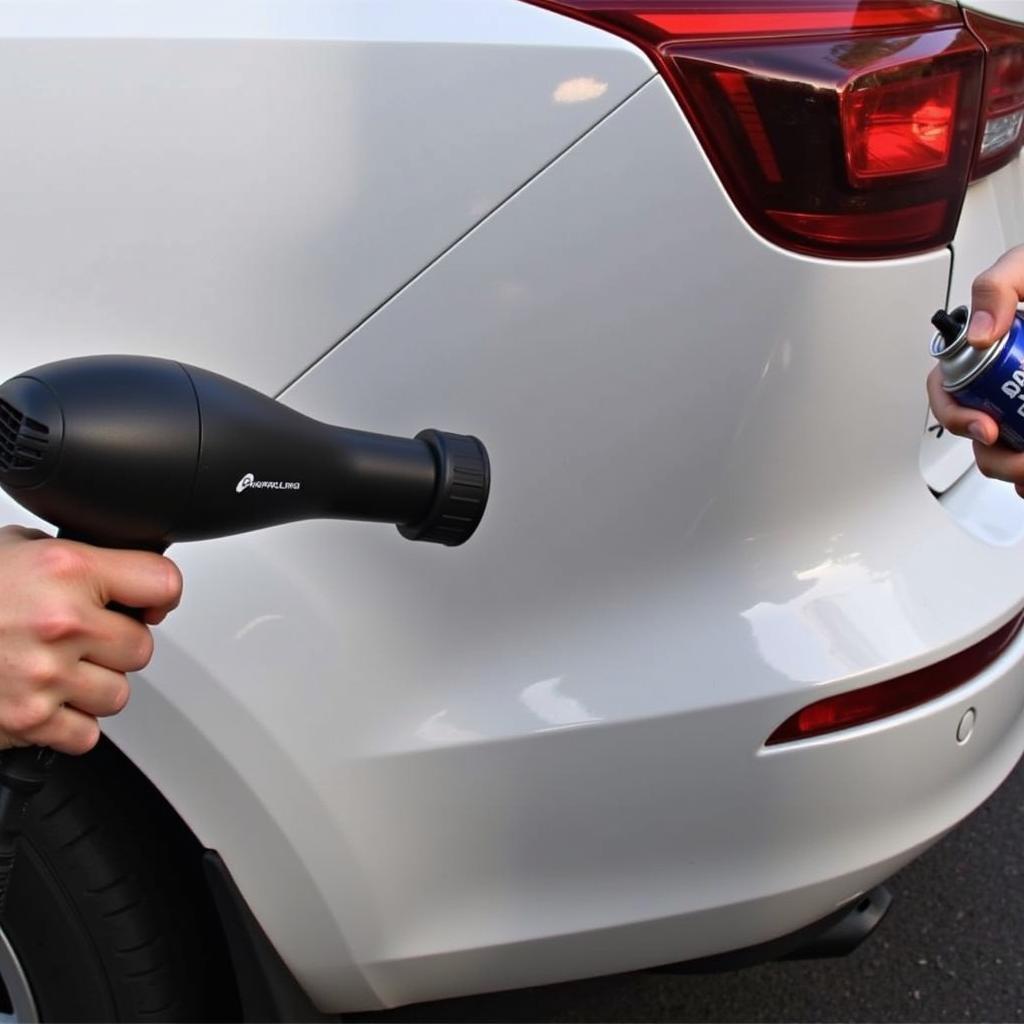 Using Hair Dryer and Compressed Air on Car Dent