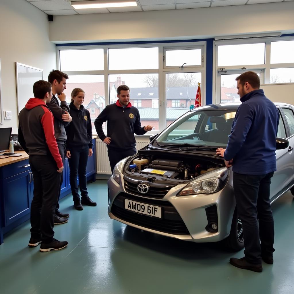 Students Learning Car Maintenance in an Essex Classroom