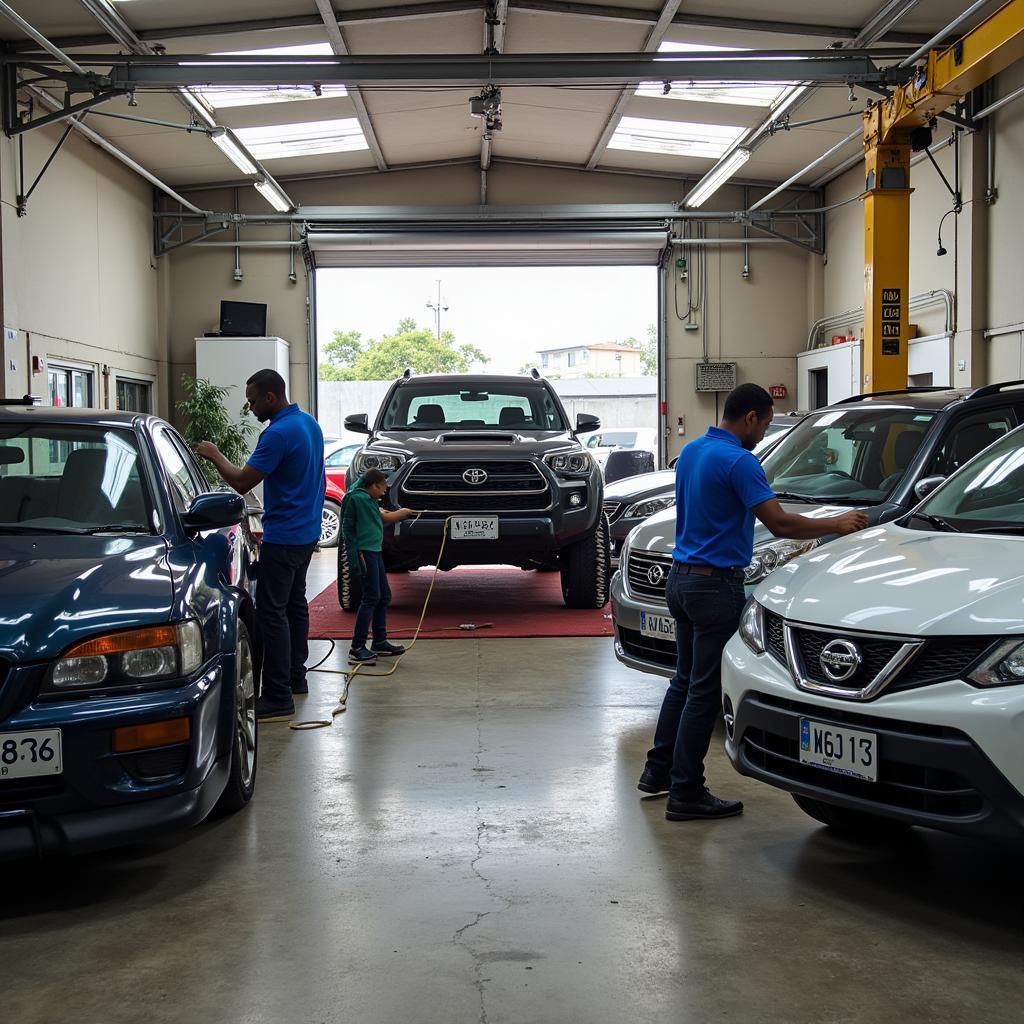 A busy car glass repair shop in Lagos