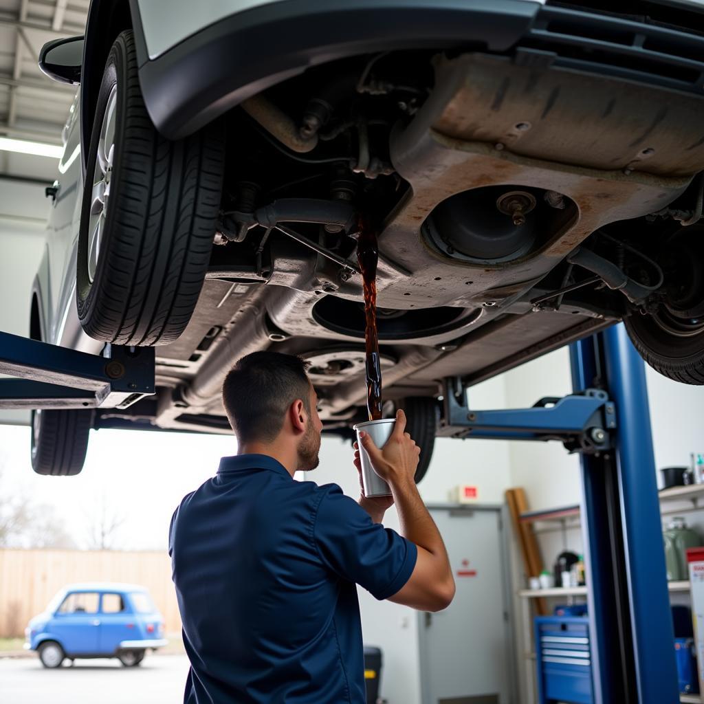 Car Undergoing an Oil Change Service