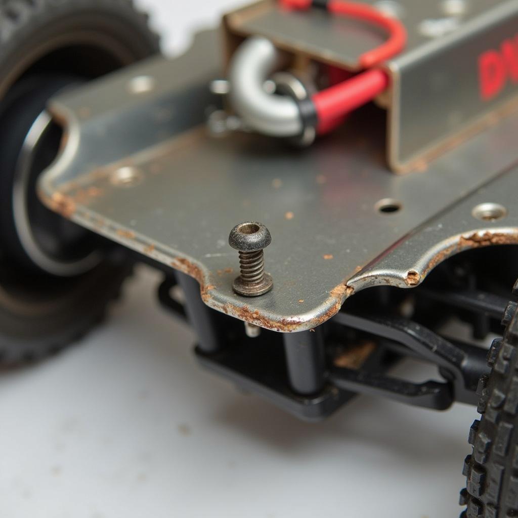 Stripped Screw on an RC Car Chassis