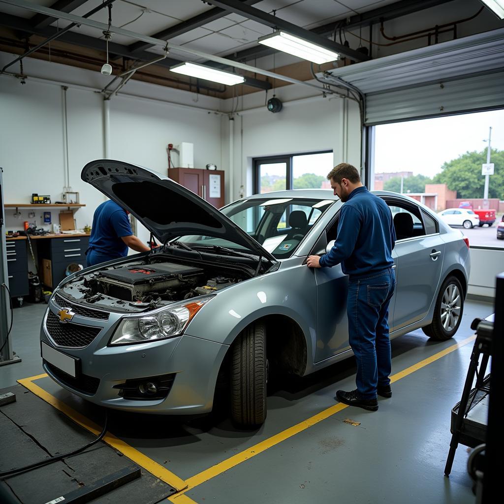 Auto Body Repair Shop Fixing Damaged Car