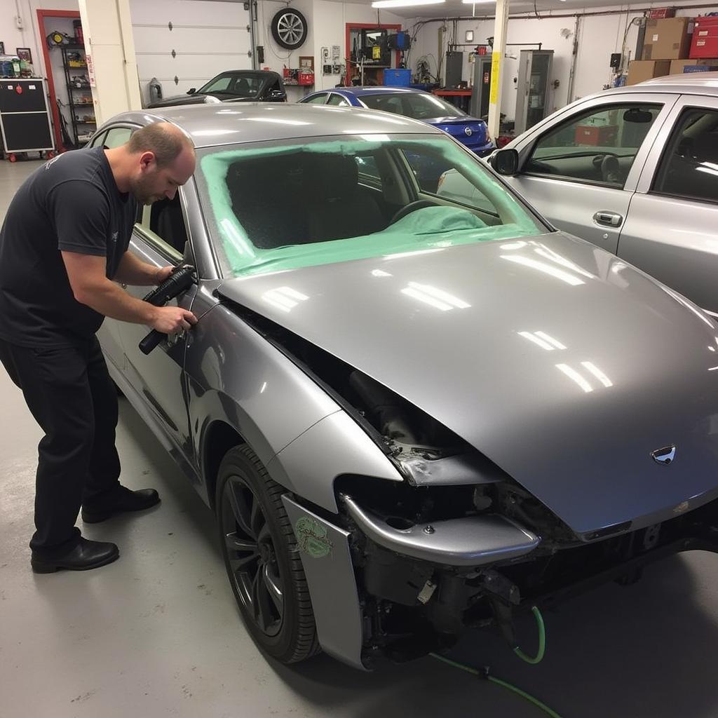 Car hail repair process in a body shop