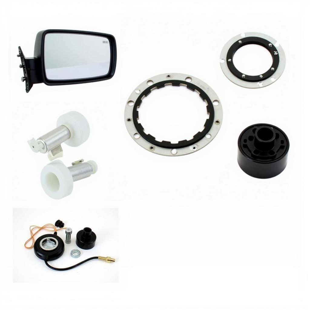 An assortment of car rear view mirror replacement parts, including the mirror glass, housing, and mounting bracket.