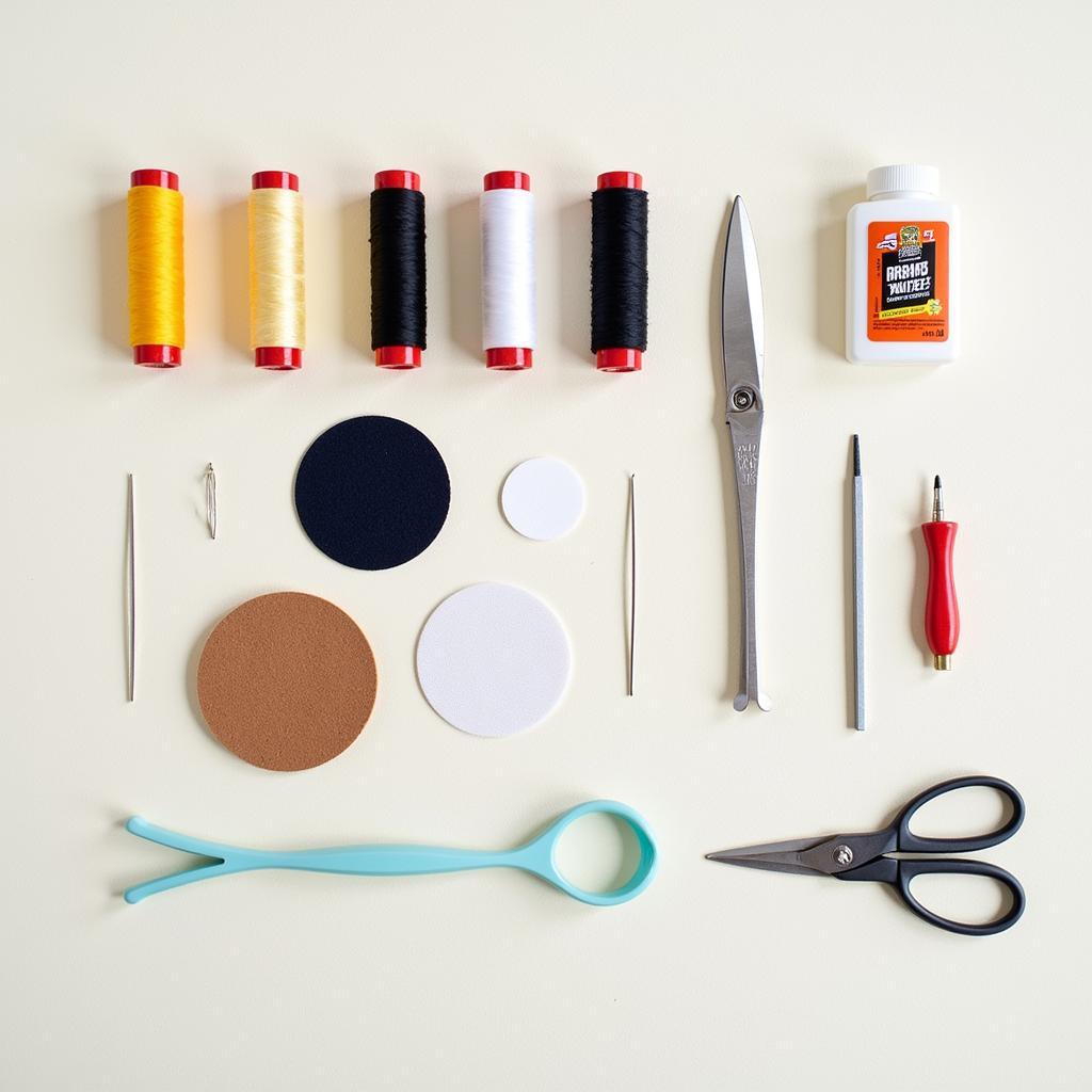 Various tools and materials in a cloth car seat repair kit